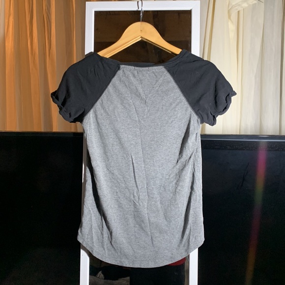 Well loved T-shirt in fair condition. Looks really cute on. - Picture 2 of 2